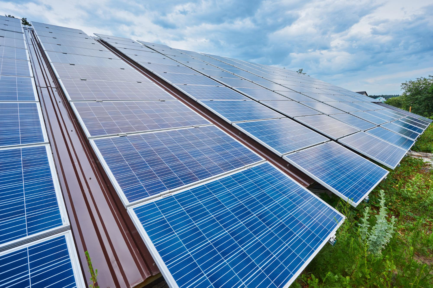 Solar panels on rooftop generating renewable energy – sustainable solar power system installation for homes and businesses.
