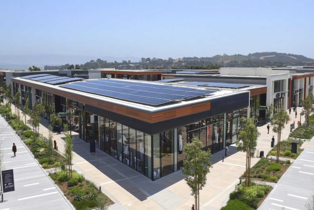 Commercial solar panel installation on modern retail shopping center for clean energy use